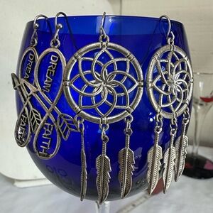 Group of silvertone earrings dangles and hoops